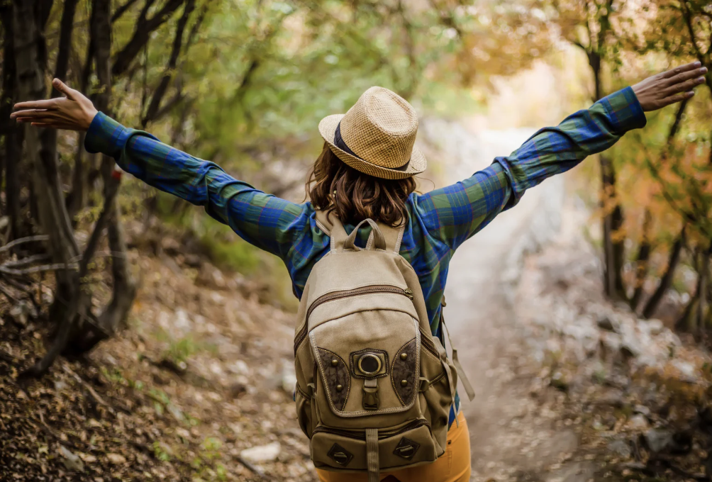 A person walking in the woods.